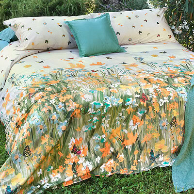 bed met dekbedovertrek Sunfield van egyptisch katoen