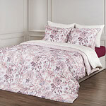 slaapkamer met roze print dekbedovertrek tencel